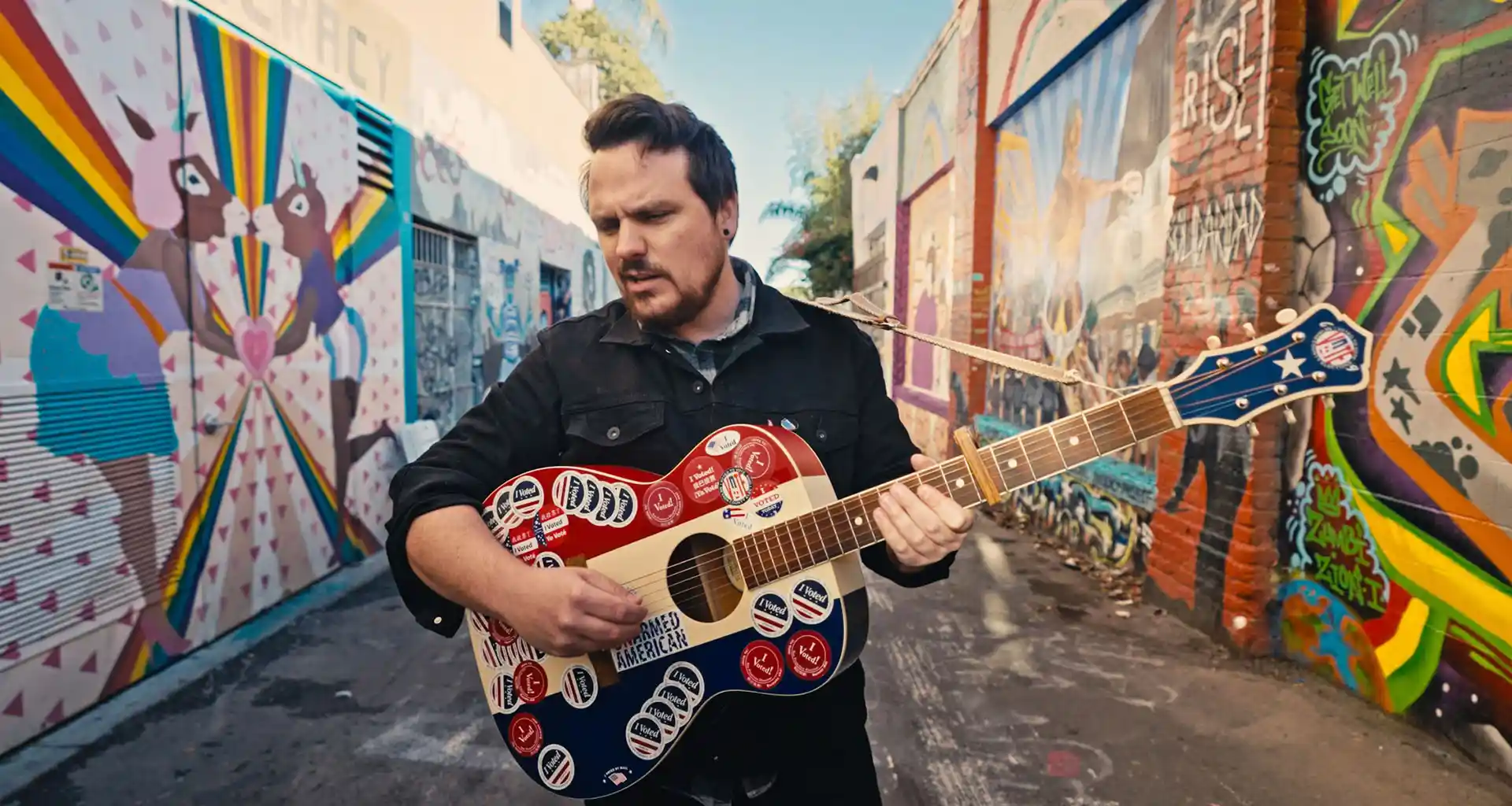 The Sam Chase, standing in the Mission surrounded by Graffiti - landscape size